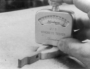 Fig. 8. Durometer in use to measure hammer hardness.